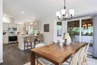 ...gather formally there or sit up at the counter for less formal dining.
