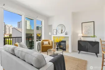The living room is spacious, and centered on a gas firelplace- super cozy on those winter evenings.