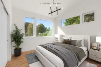 ADU bedroom with oversized window + natural light.