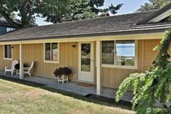 Covered front porch extends the north side of your home and provides a nice place to find shade on hot sunny days. Let's go inside....
