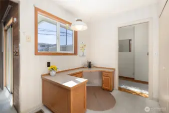 A convenient built in desk area off the kitchen.