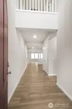 Entry with high ceilings. Pictures are for representational purposes only, colors and features may vary.