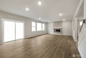 Living room with fire place. Pictures are for representational purposes only, colors and features may vary.