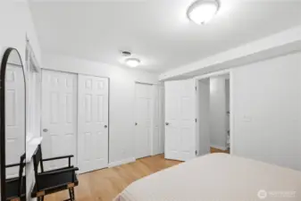 Double closets extend the full length of the wall, offering excellent storage.