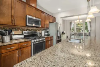 HUGE Kitchen Island with Gas Range and Stainless Appliances