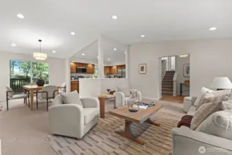 The ultimate expression of the open-concept lifestyle. This vantage point perfectly captures the home’s intuitive flow, where the living, dining, and culinary spaces merge into one expansive, sun-drenched sanctuary.