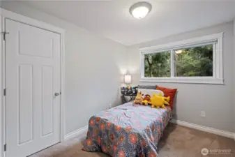 smaller of the three bedrooms