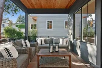 Covered deck includes attached heater overhead for year-round enjoyment!
