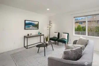 A comfortable and well-proportioned upper level bedroom features plush carpet, ample natural light, and a clean neutral finish, a welcoming space ready to suit any lifestyle need.