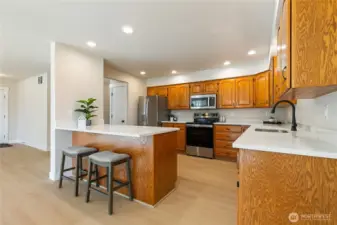 So much cabinetry and a pantry in the kitchen!