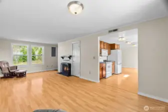 Another view of the large living room that opens to the galley kitchen.