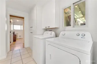 Washer/ Dryer w/ a folding table or can be used as breakfast bar