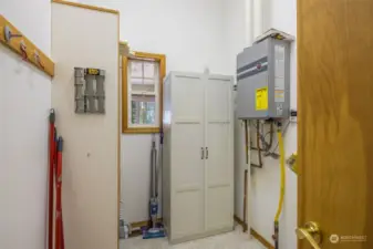 Mechanical room with forced air furnce and on-demand hot water tank