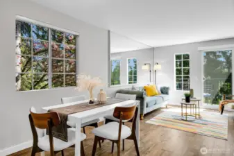 Dining area conveniently located between the kitchen and living room.