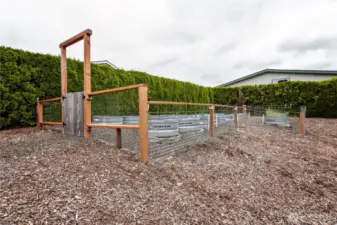 Community park has raised beds to create community and food for all.