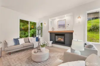 Windows in the living room look out to nature and create a serene environment even when inside.