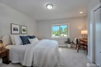 Second Bedroom is very spacious and light filled.