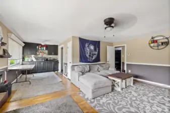Living room, beds through door way on right