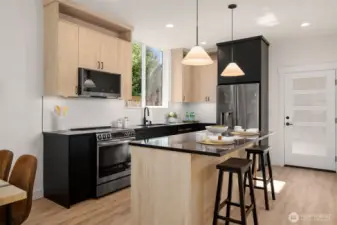 Gourmet kitchen with quartz island.