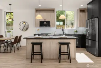 Kitchen with premium appliances + custom cabinetry.
