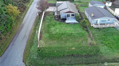 Huge yard offers privacy and room for gardening & socializing!