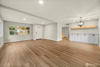 Dining room off living room with built in cabint