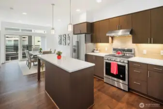 Oversized island for cooking, serving, or gathering around.