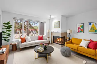 Enjoy the spacious living room with abundant natural light and wood burning fireplace. The owner has installed new carpet and professionally repainted the interior walls.  Nothing to do but move in.