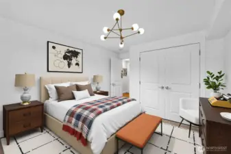 Primary bedroom with new carpet and paint overlooks balcony. Double size closet keeps all your items organized.