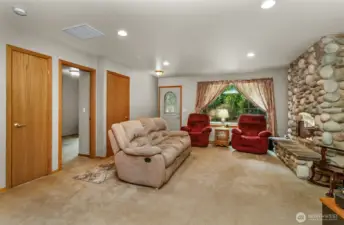 Main living area with stone fireplace