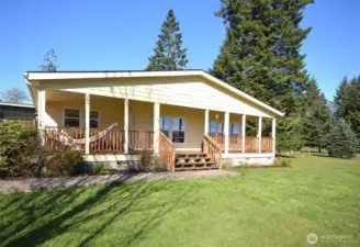 Situated on 2.5 level, fully fenced acres, this charming 3-bedroom, 1.5-bath home offers 2,050 sq ft of comfortable living space, a 2-car garage, hookups for 2 RVs, a barn, and a chicken coop—perfect for hobby farming, animals, toys, and outdoor living.