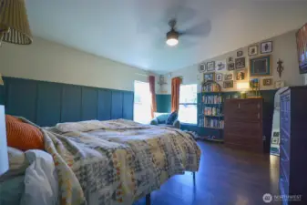 Spacious primary bedroom offering comfort, privacy, and plenty of natural light.