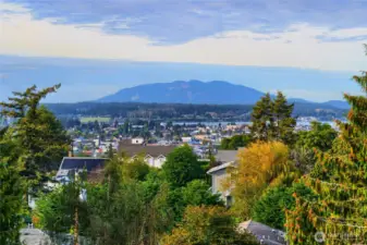 True Northwest Beauty. From mountains to sound to territorial views, this home was built to appreciate them all.