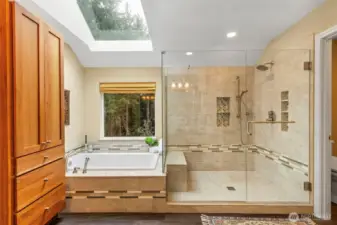 Luxurious & spacious jetted soaking tub & tile shower.