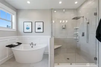 Soaking tub and custom glass shower doors for the walk-in shower