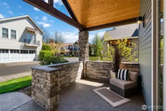 Enjoy the front covered patio with a nice sitting area