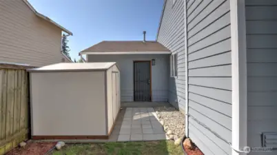 Shed on backyard for extra storage.