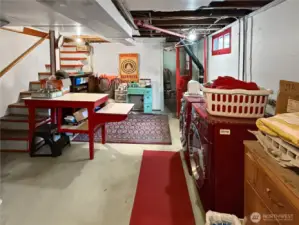 This spacious basement area is more than just laundry — it’s a flexible zone for projects, hobbies, storage, and creativity. With easy access to the backyard and stairs leading up to the main level, it’s both practical and connected. Whether you’re folding clothes, refinishing furniture, or storing your seasonal gear, this hardworking space has your back.