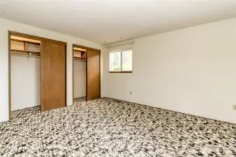 Big primary suite with two lighted closets.