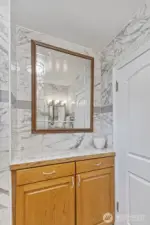 Additional cabinets and vanity space in the downstairs bathroom.