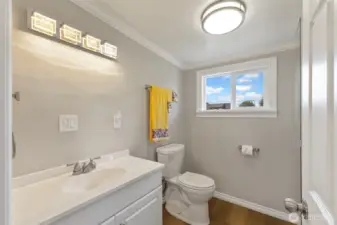 Upstairs half bath.