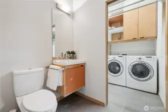 Half bath and adjacent laundry, main level.