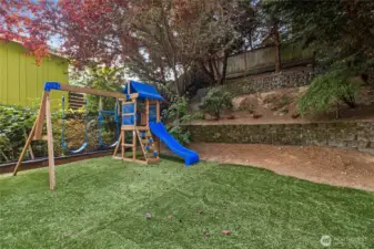 West side of property, fully secluded. The turf is laid over a stone patio and can be removed.