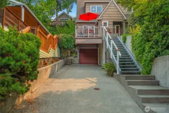 4 off-street parking spots: attached garage + carport + room for 2 more cars on this long driveway.