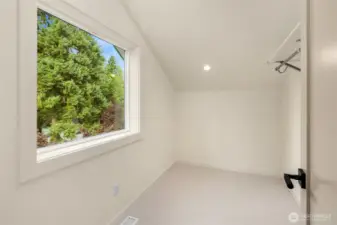 Spacious walk-in closet in third floor bedroom