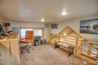 UPSTAIRS SPLIT LOFT ONE SIDE IS CURRENTLY AN OFFICE THE OTHER IS A BED