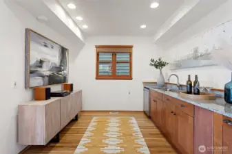Wet bar can be converted to kitchenette, is plumbed and piped (main level)