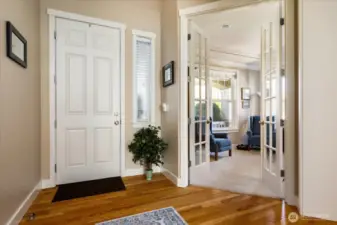 Step inside to a warm and inviting entry filled with natural light