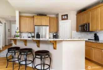 Kitchen refresh in 2023/2024 - new granite countertops, backsplash, sink & faucet. Upgraded appliances.