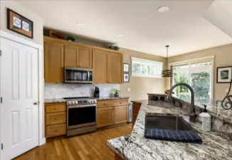 Plenty of cabinet space and walk in pantry